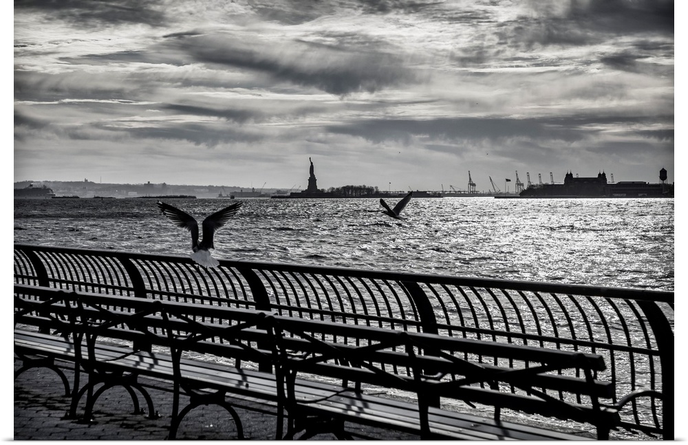 New York City, Hudson River with view of Statue of Liberty from Battery Park City.