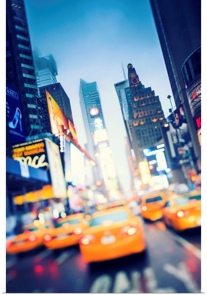 New York, New York City, Manhattan, Times Square, Yellow taxi cabs at night.