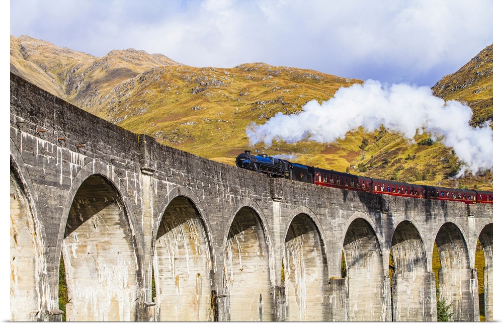 Scotland, Highland, Glenfinnan, Great Britain, British Isles, The Jacobite steam train on the Glenfinnan viaduct which ins...