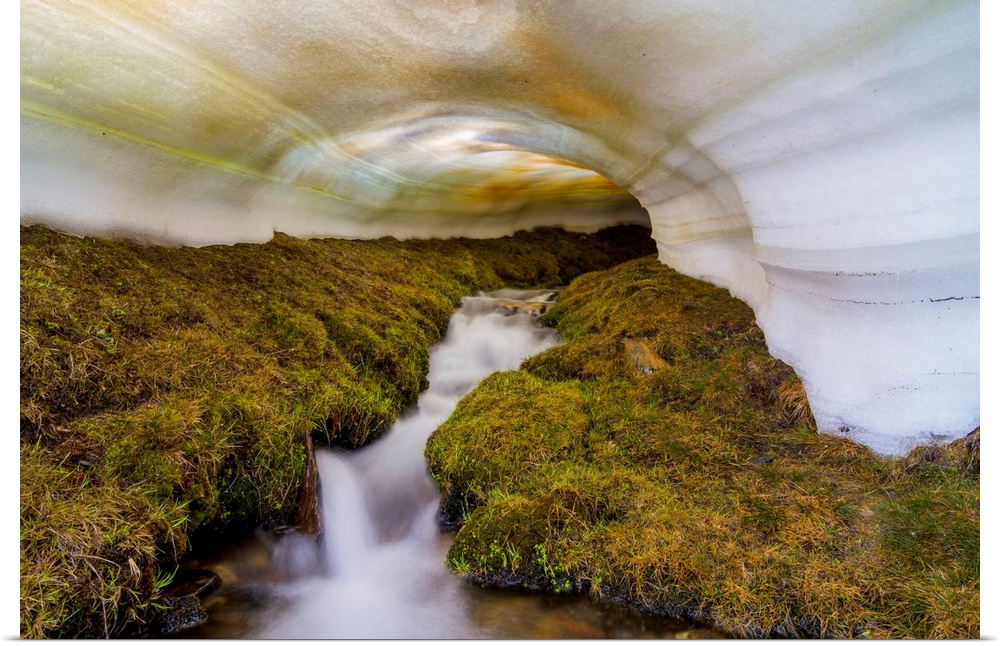 Spain, Andalusia, Sierra Nevada National Park, A snow tunnel in Lavaderos de la Reina during the spring melting period.