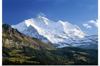 Switzerland, Bern, View towards Wengen village, Eiger, Monch and Jungfrau mountains