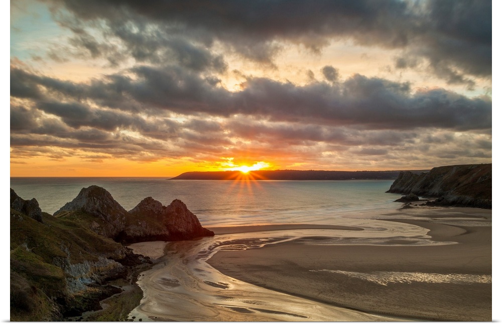 UK, Wales, Gower Peninsula, Great Britain, Three Cliffs Bay at sunset.