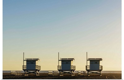 USA, California, Los Angeles, Venice Beach, Lifeguard Towers At Sunset