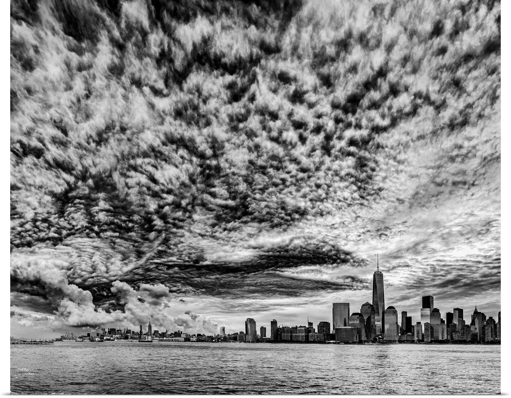 USA, New York City, Freedom Tower, Clouds over Manhattan, viewed from New Jersey at dawn.