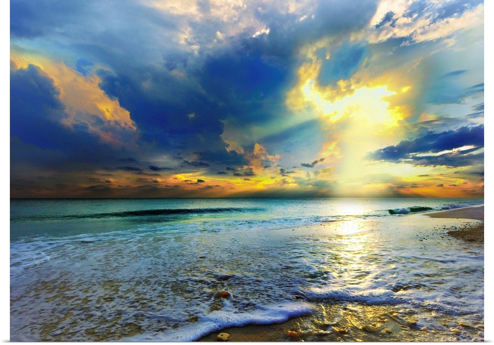 Bright golden sunrays cast light onto the Emerald seascape below. Landscape taken on Navarre Beach, Florida.