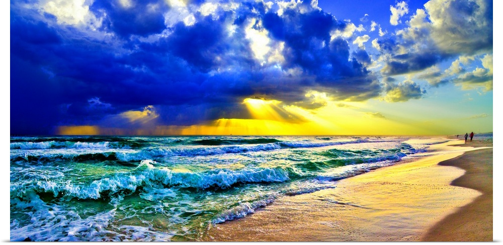 Blue and green waves beneath a golden sunrays sunset. Landscape taken on Navarre Beach, Florida.
