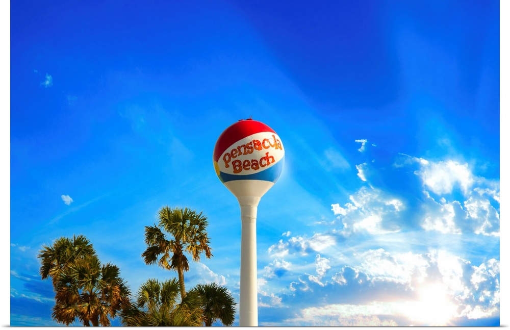 Pensacola Beach Ball Water Tower and Palm Trees in this skyscape.