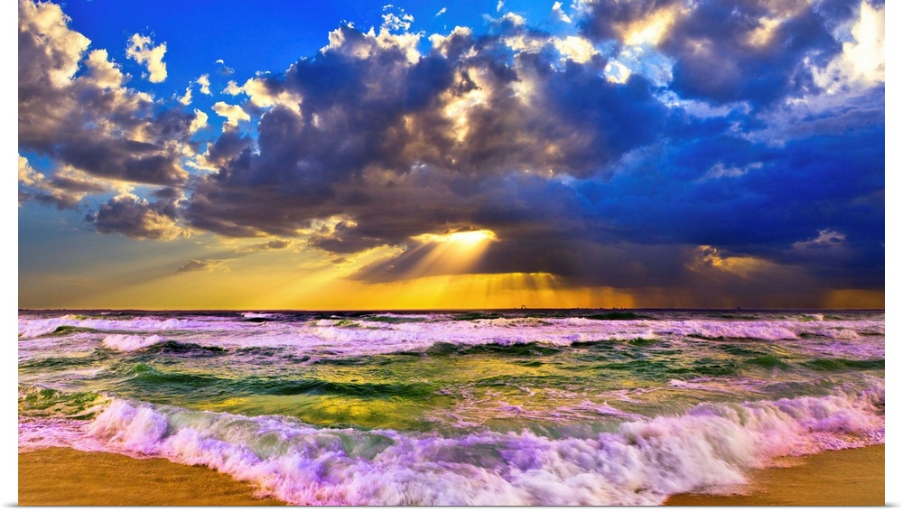 A brilliant sunset over a stormy sea. A sunset panorama taken in Destin Florida with stormy sea waves and sun rays burstin...