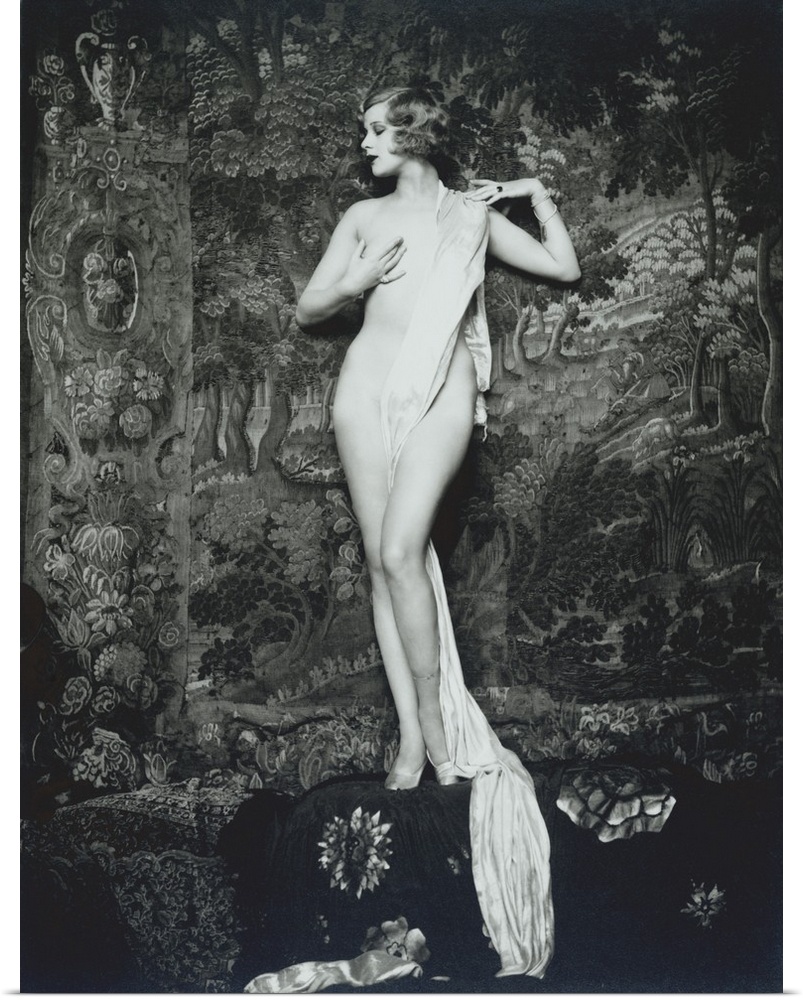 Actress, dancer, and Ziegfeld girl Hazel Forbes. Full length portrait of Forbes nude and draped in cloth in front of a tap...