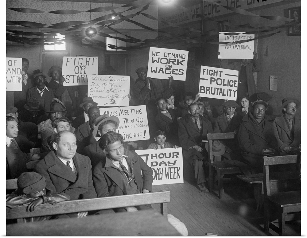 African Americans and Whites at a Communist meeting before a protest demonstration. Ca. 1919-1920. Signs displayed read: F...