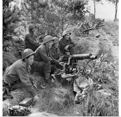 British troops at action stations ready to provide covering fire for the infantry