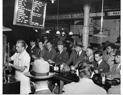 Businessmen eating at Pete's Bar in Washington Market, New York City, 1950