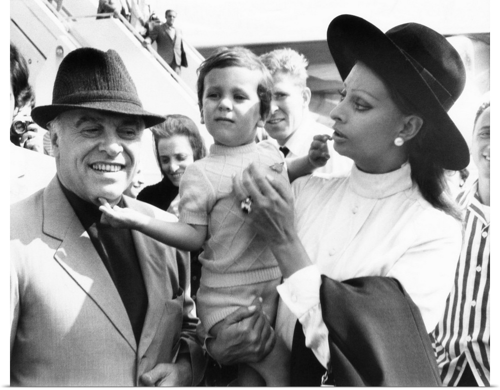 Carlo Ponti, Jr. arrives in New York with his famous parents: Italian film producer, Carlo Ponti Sr., and actress Sophia L...