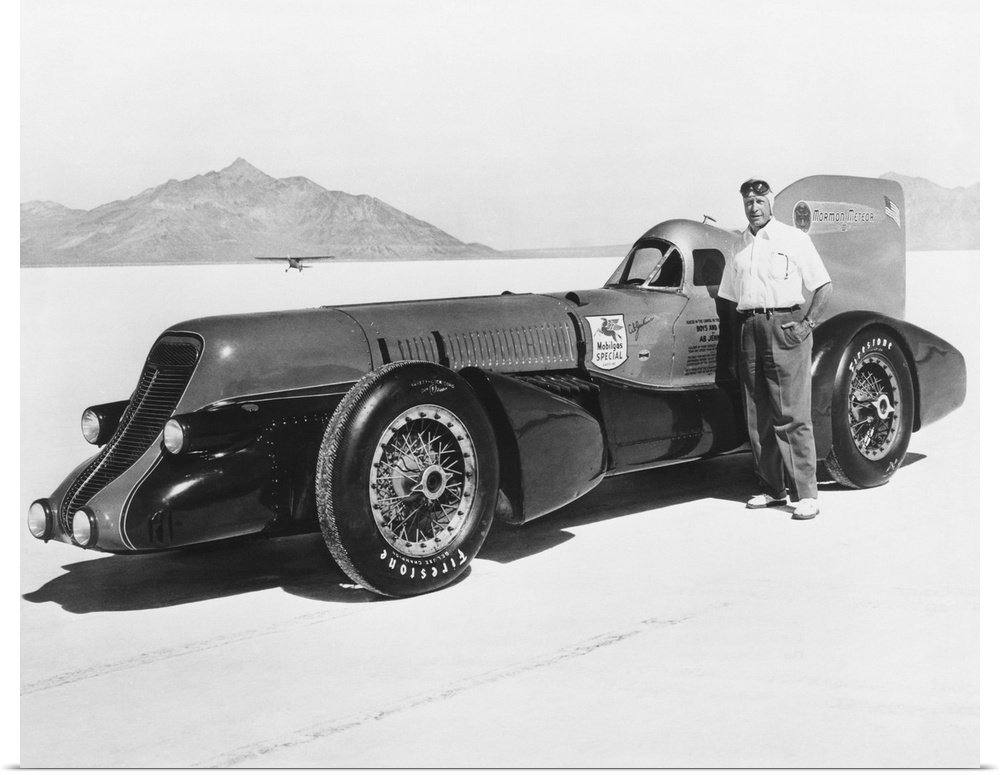 David Abbott 'Ab' Jenkins and the Mormon Meteor III on the Bonneville Salt Flats, c. 1940. Meteor III was built in 1937 to...