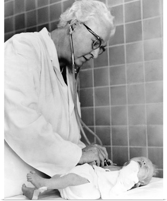Dr. Virginia Apgar examining a newborn baby with stethoscope, Oct. 2, 1966