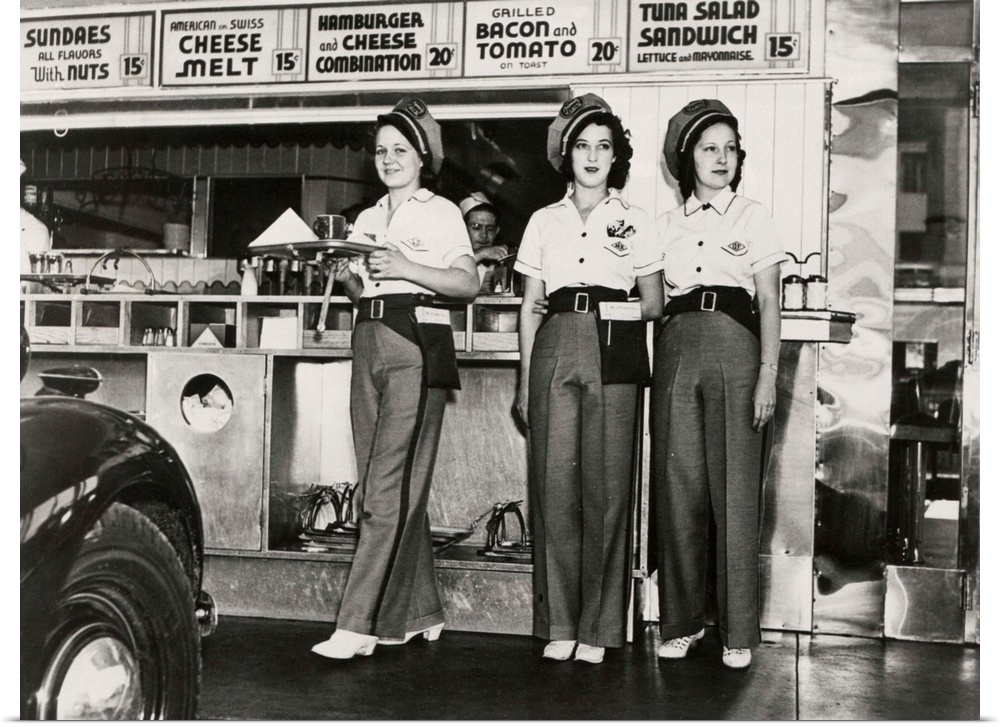 Drive-in restaurant in Hollywood, Los Angeles. June 29, 1938. The waitresses wear pseudo Highway Patrol Uniforms. The Fast...