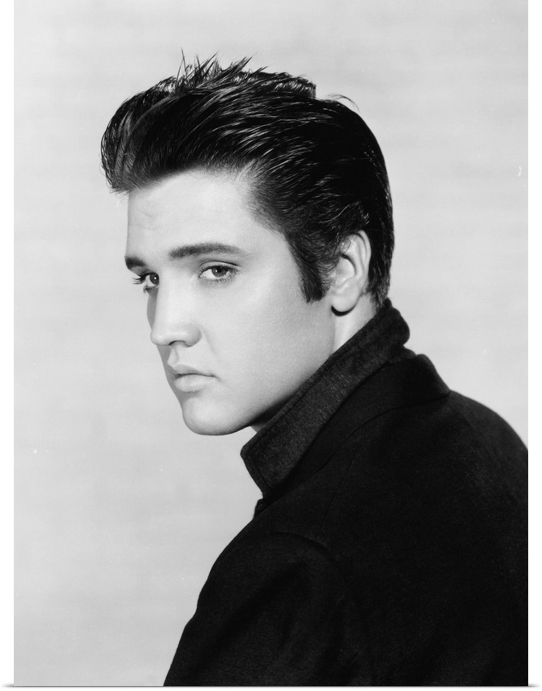 Black and white photograph of Elvis Presley.