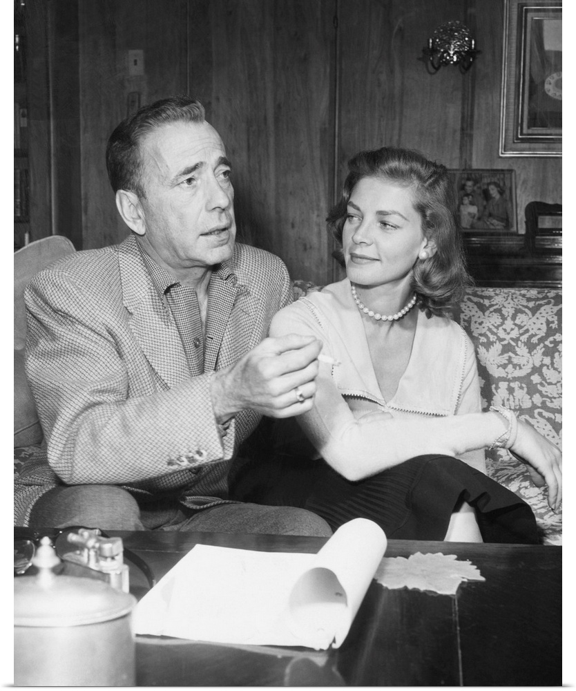 Humphrey Bogart and Lauren Bacall in their living room. May 1955.