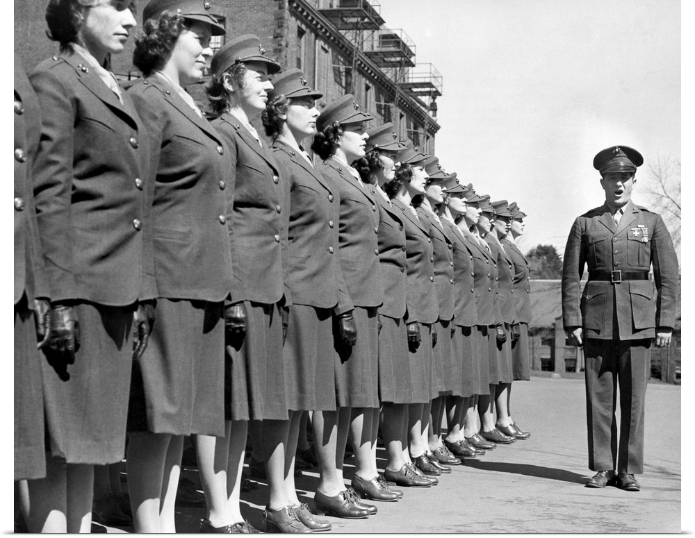 Drill Instructor with uniformed recruits at Marine Corps Women's Reserve Officer's Candidate School. Ca.1945.