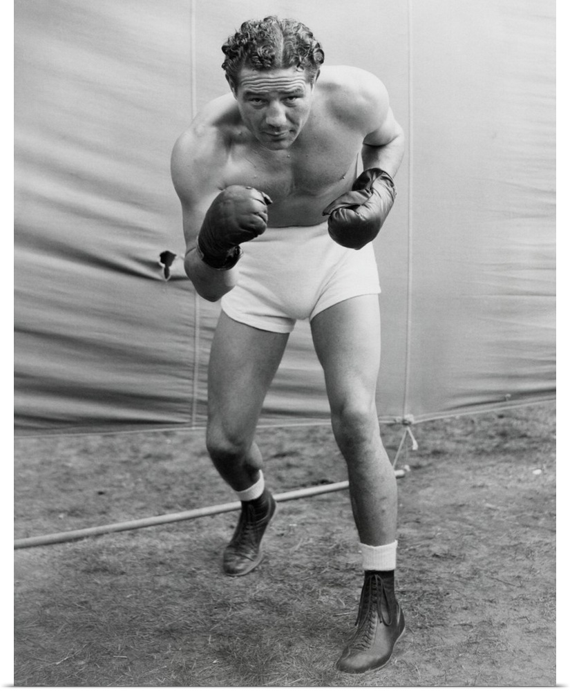 Max Baer, former World Heavyweight Champion at his training camp in Speculator, NY. He was getting into shape for a Yankee...