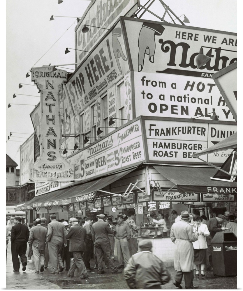 Nathan's Hot Dogs food stand on the Coney Island Boardwalk, May 11, 1954. Brooklyn, New York City.