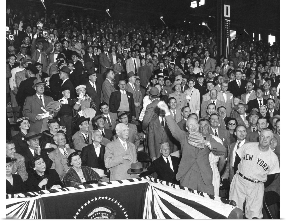 President Eisenhower throwing out the first ball of the 1954 Baseball season at Griffith Stadium. At left is Casey Stengel...