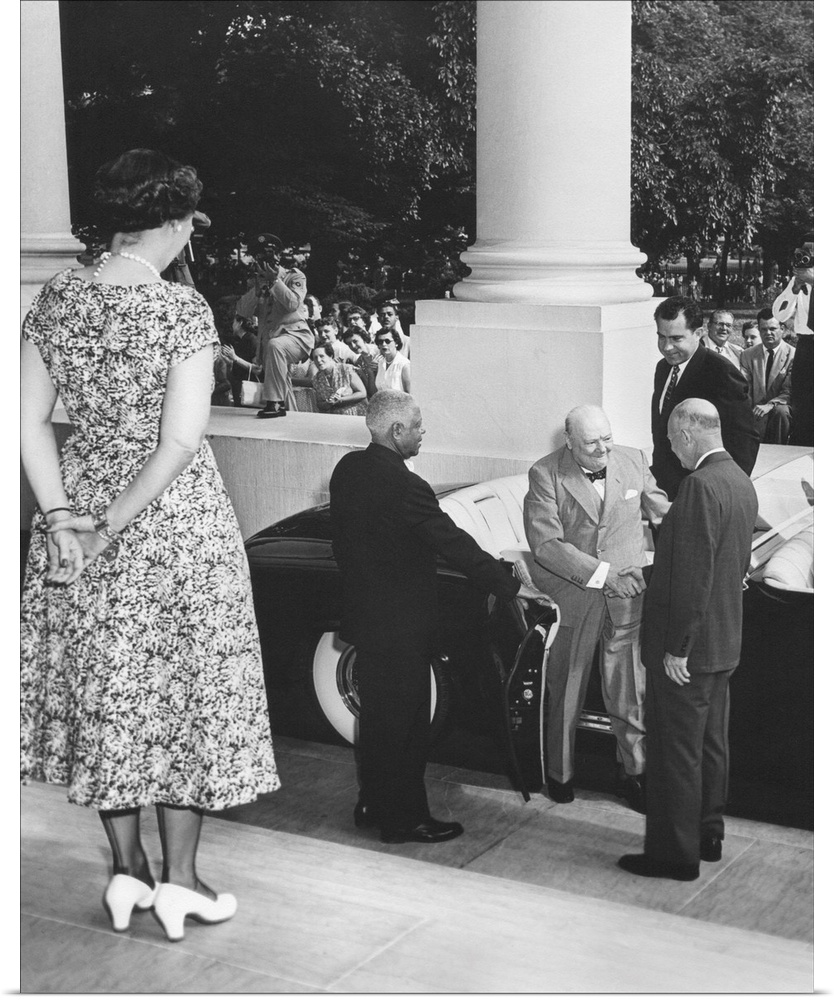 President Eisenhower welcomes Prime Minister Winston Churchill of Britain at the White House. First Lady Mamie Eisenhower ...