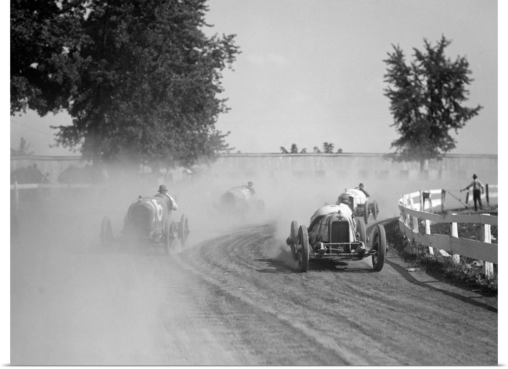 Racecars rounding a turn at the Rockville Fair auto races, August 25, 1923.