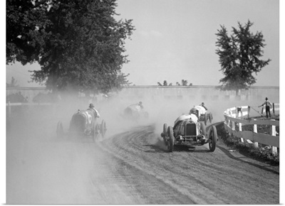 Racecars rounding a turn at the Rockville Fair auto races, August 25, 1923