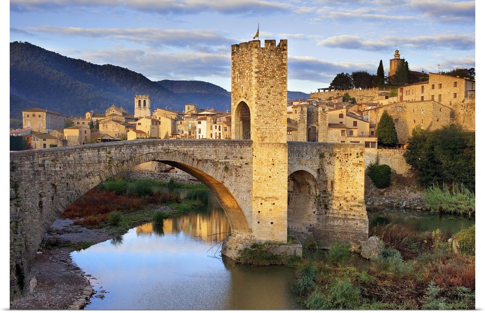 SPAIN. Besalu. Romanesque bridge over the Fluvi river. Romanesque art. -