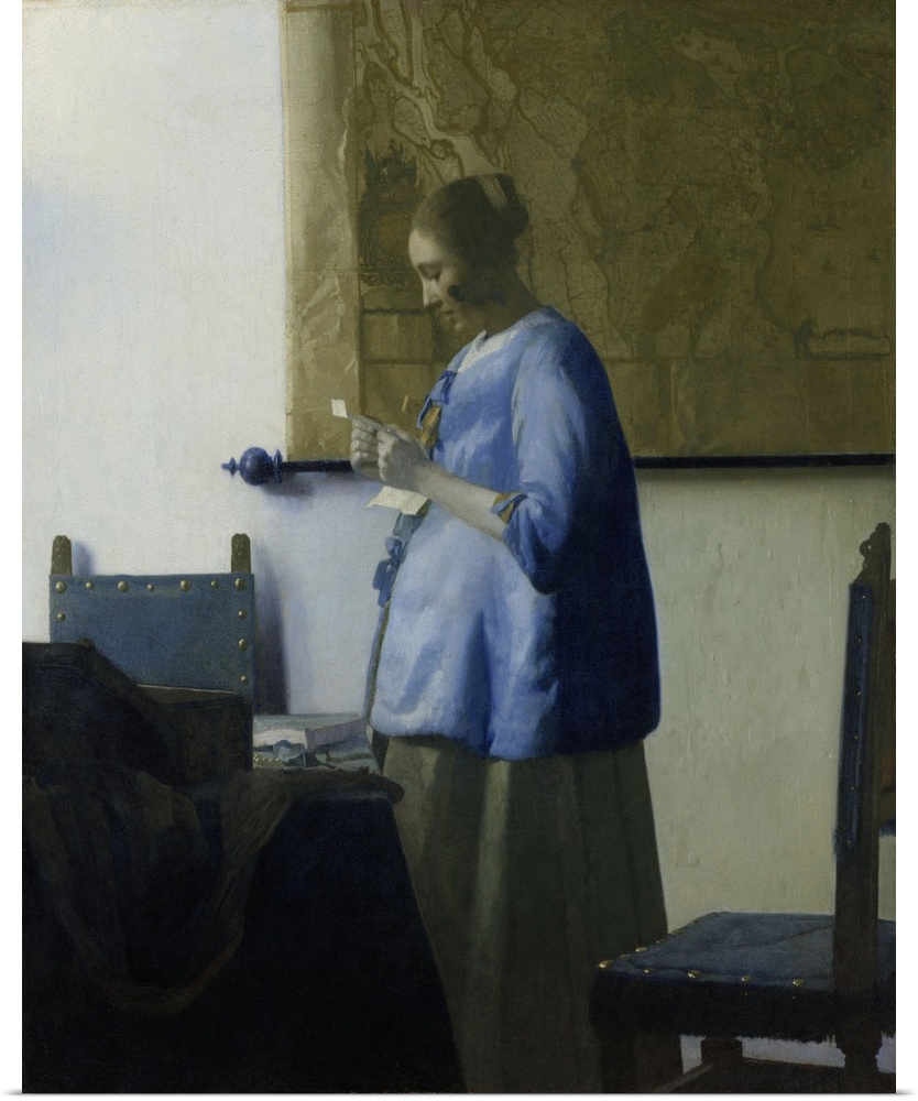 Woman Reading a Letter, by Johannes Vermeer, 1663, Dutch painting, oil on canvas. A young woman in a blue jacket, stands b...
