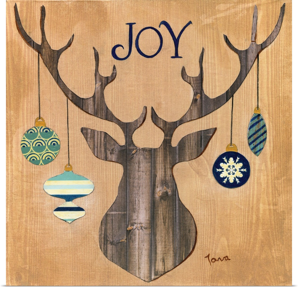 A decorative seasonal piece with a wooden mounted deer that has ornaments hanging from the antlers.