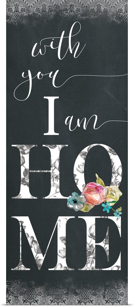 Panel typography with a chalkboard feel that reads "with you I am Home" with a decorative pattern at the top and bottom an...