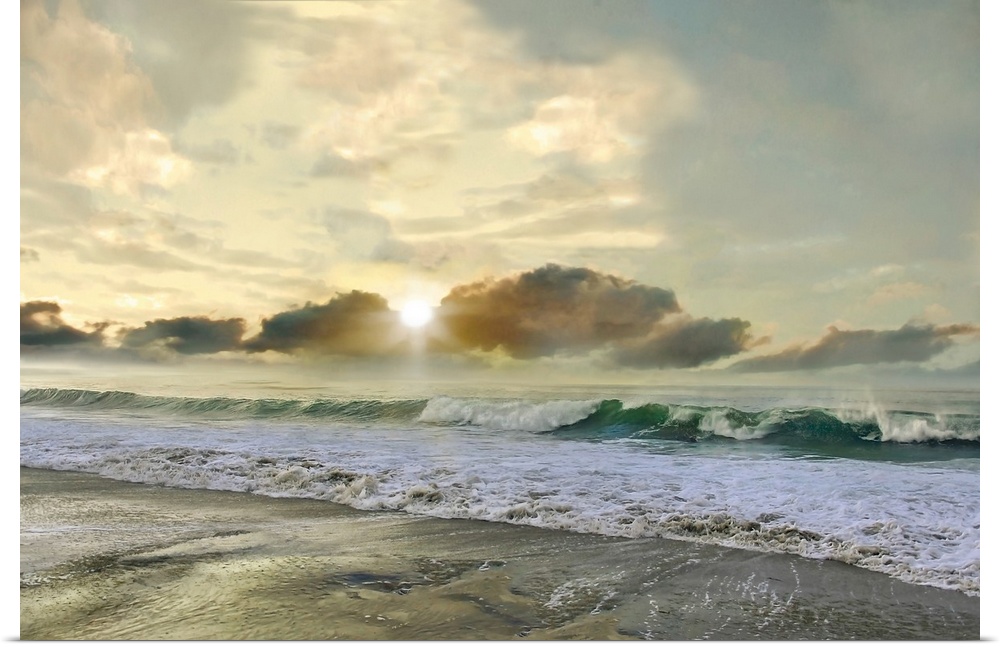 A photo with a semblance of a painting displays rolling waves upon a shore with a sun setting in the background.