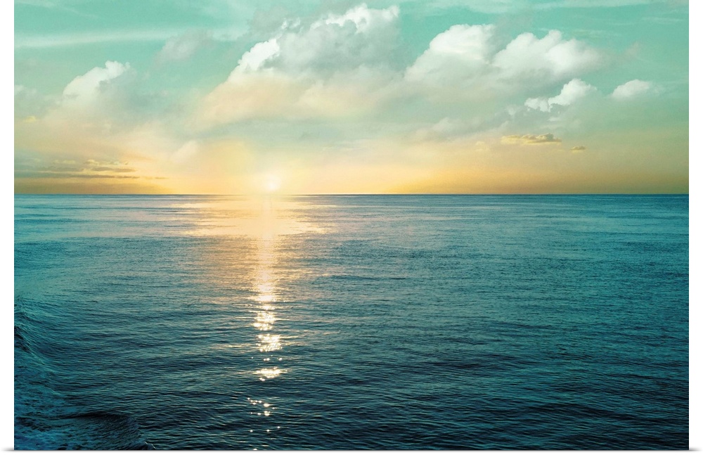 A photo of a solace sunrise glimmering on the ocean as it ascends to the sky.