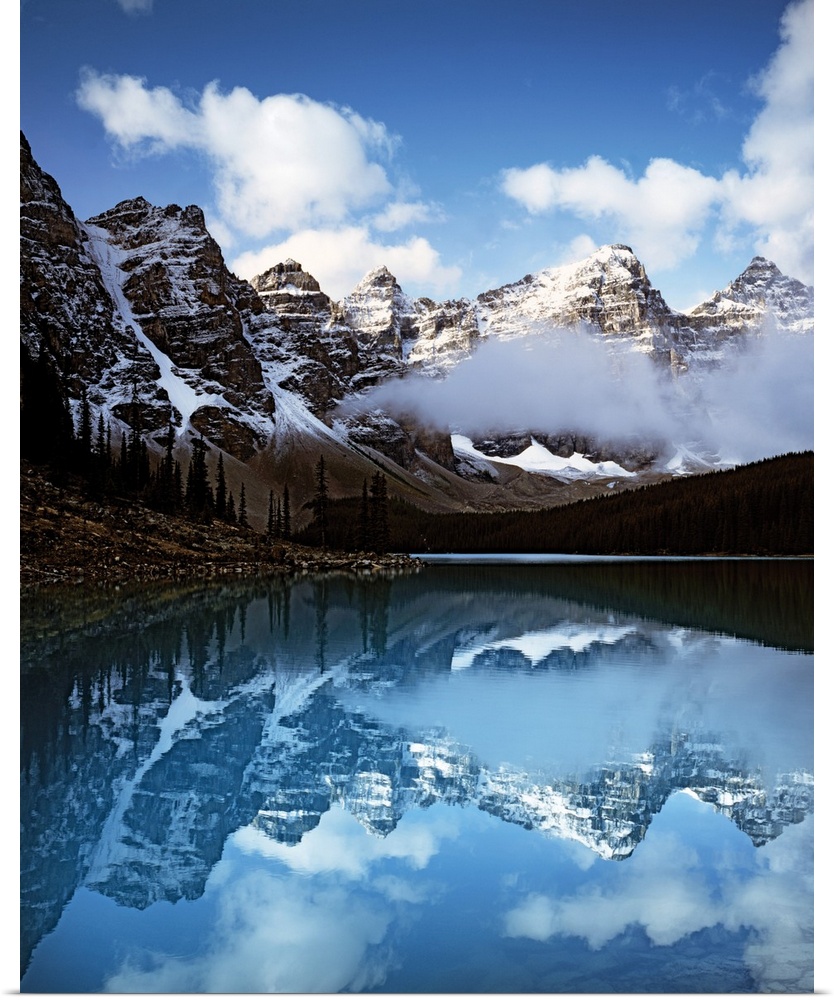 Moraine Lake surrounded by snow-capped mountains in Banff National Park, Alberta, Canada.