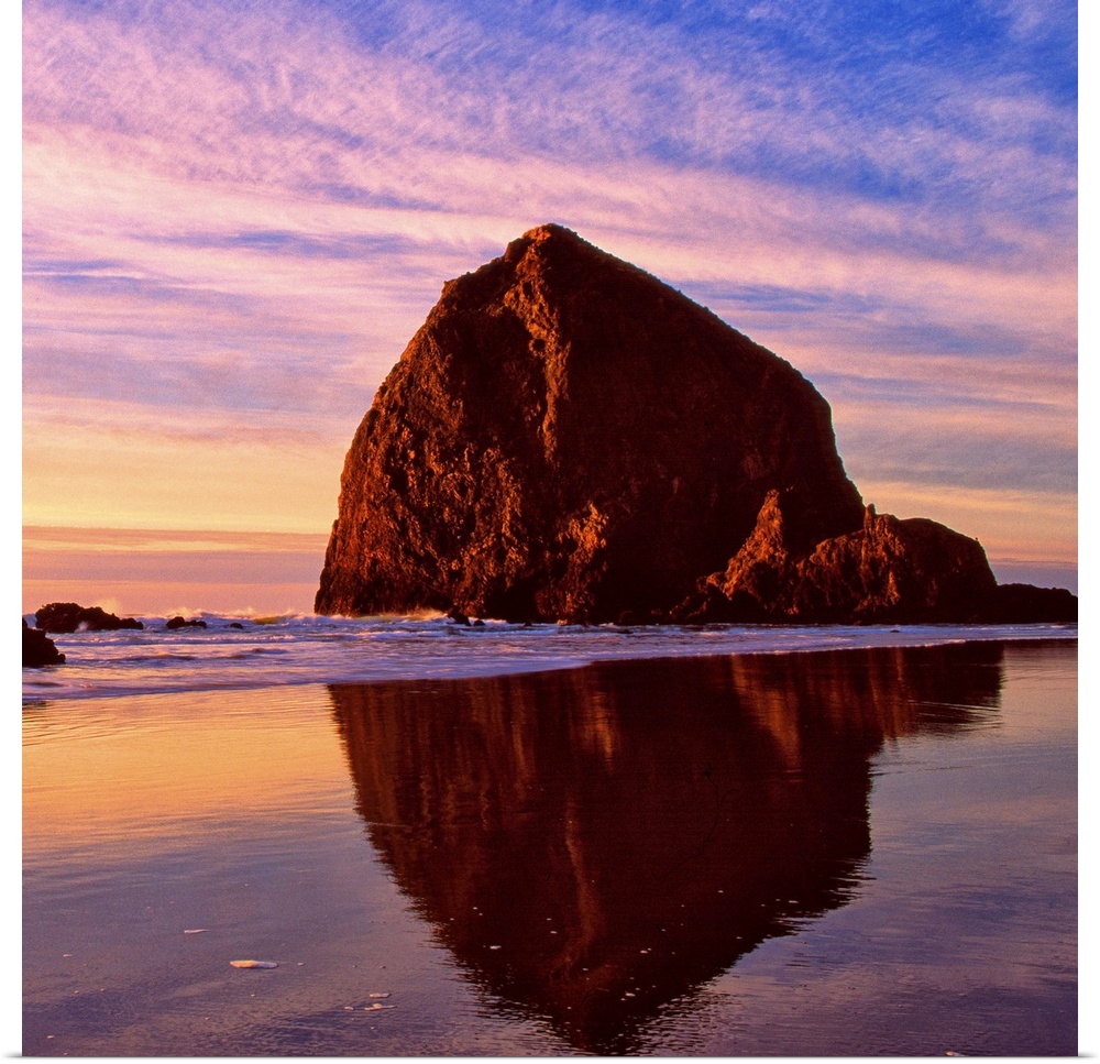 Sunset over the sea stacks at Cannon Beach, Oregon.