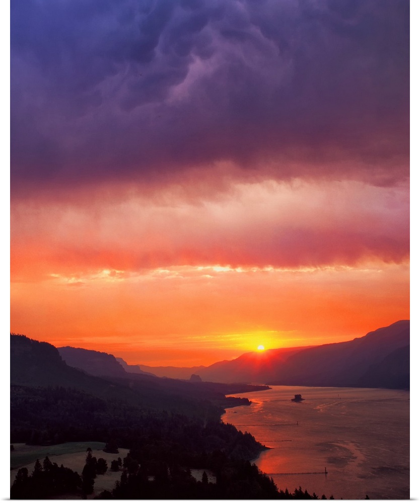 Fiery sunset with a cloudy sky over the Columbia River Gorge.