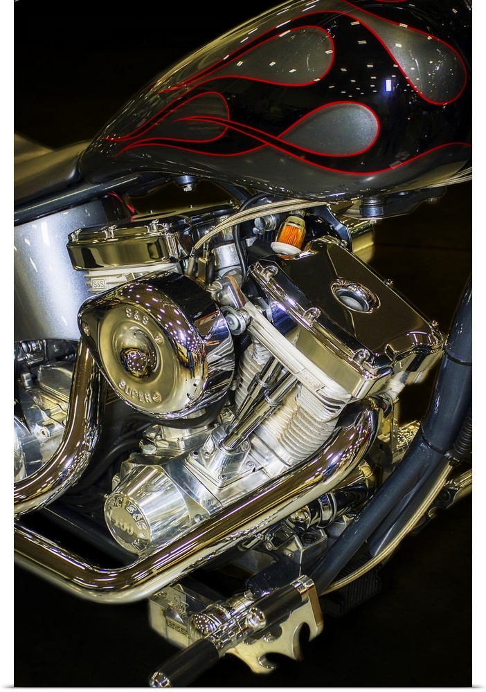 Fine art photograph of the engine and pipes of a vintage motorcycle.