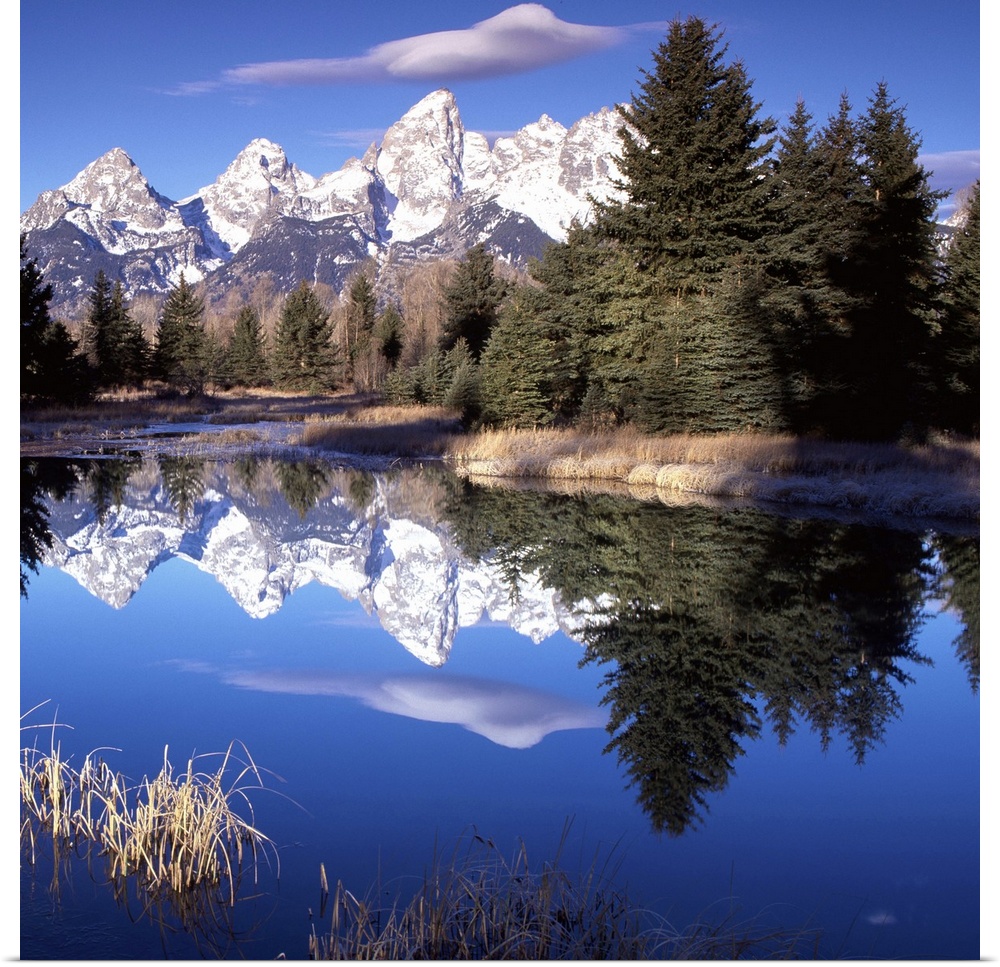 The Grand Tetons in Wyoming reflected in the lake below.