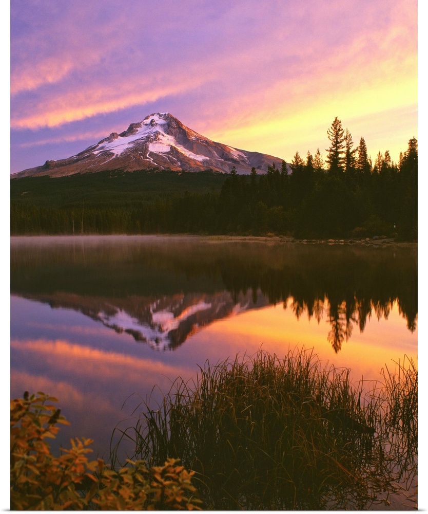 Mount Hood at sunset reflected in a lake.
