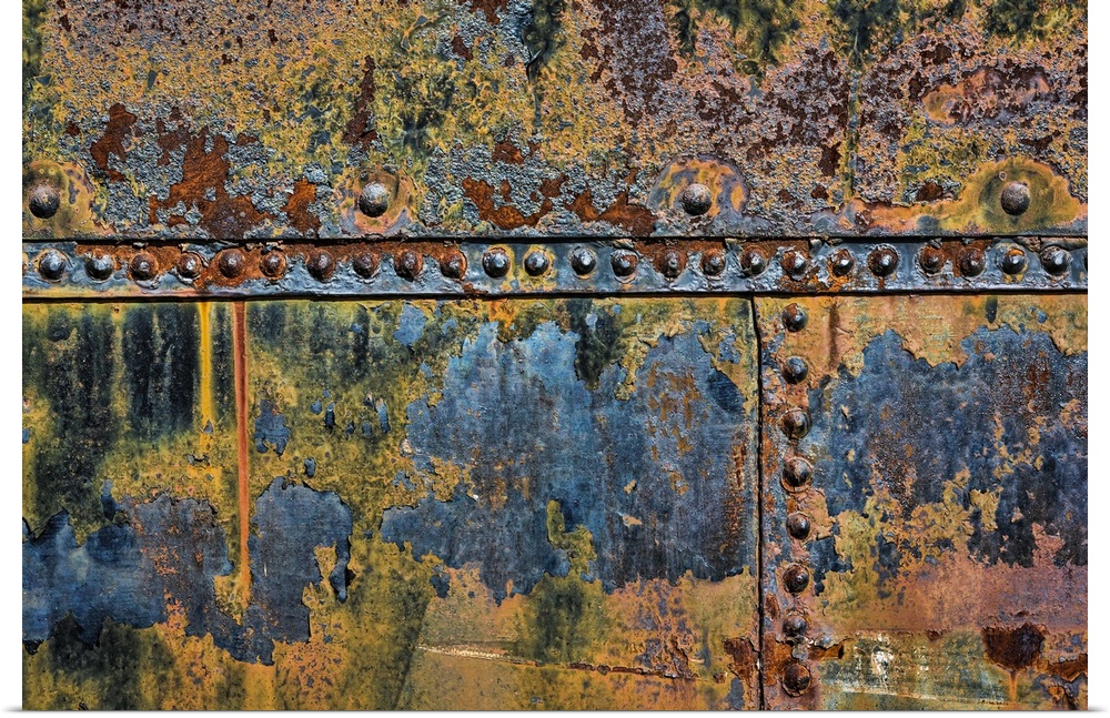 A close up photo of weathered metal elements, creating an abstract image.