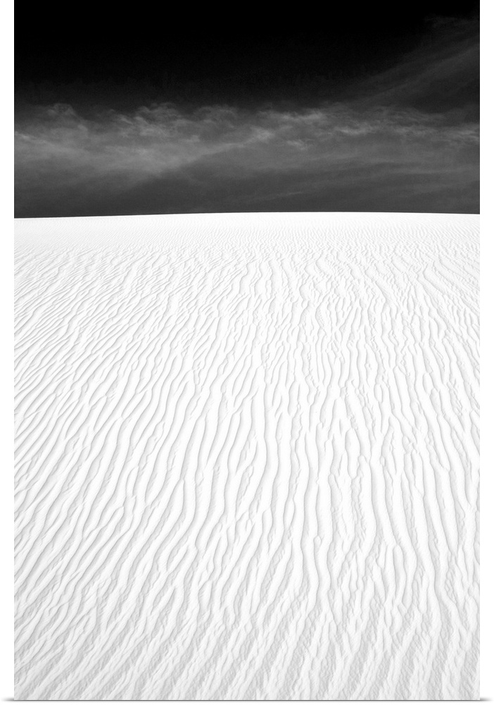 White sand dunes with several ripples.