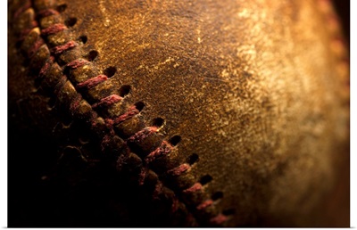 A closeup of an old baseball