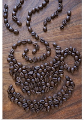 A cup of coffee illustrated using coffee beans