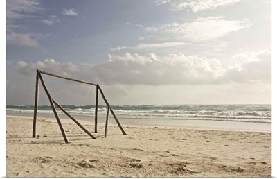 A makeshift soccer net constructed from driftwood. Tulum, Mexico, 2010.