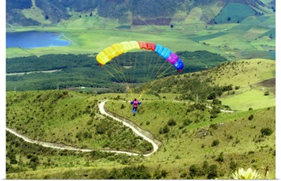 Aerial view of a person paragliding