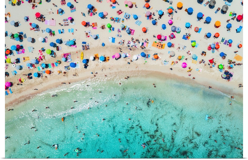 Aerial view of sandy beach with colorful umbrellas, swimming people in sea bay with transparent blue water in sunny mornin...