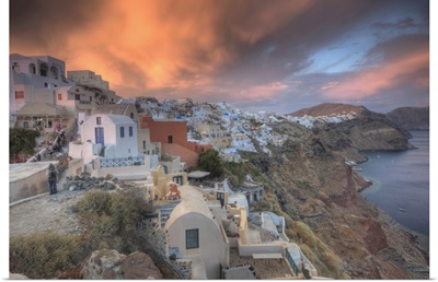 Along the cliff of Oia, houses have been delved into the porous volcanic rock