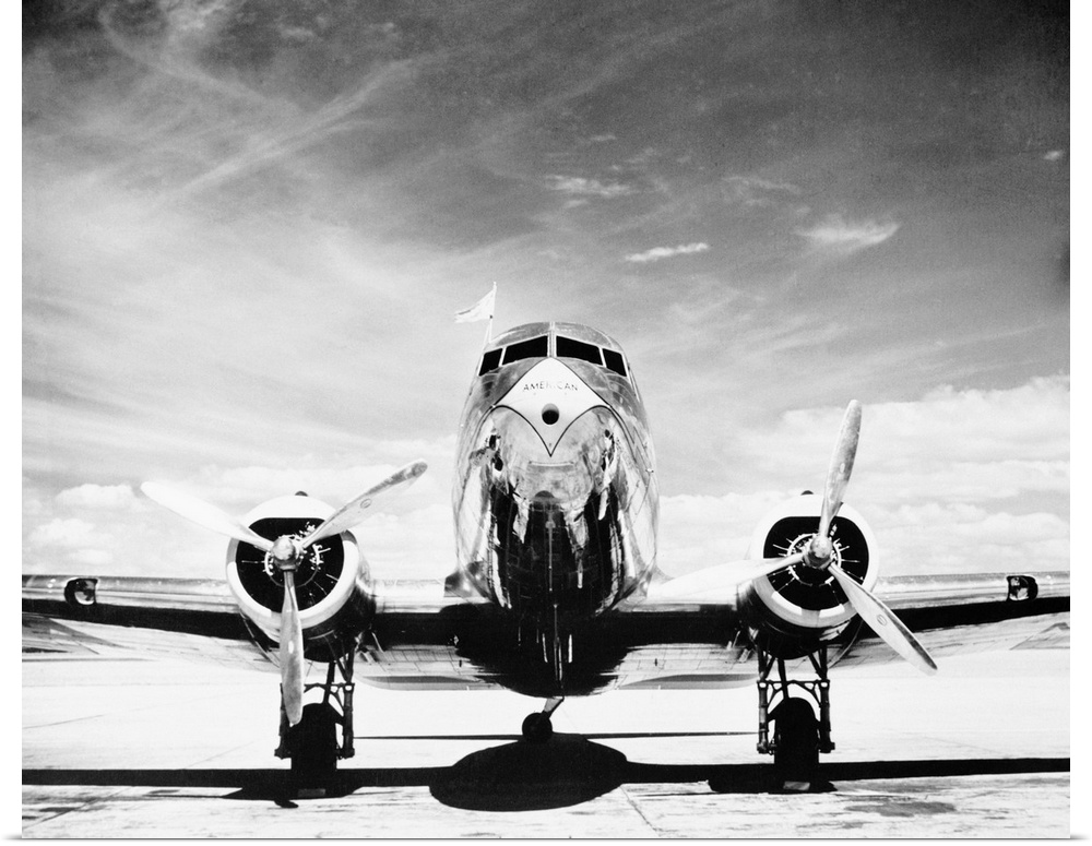 American Airlines DC-3 passenger airplane waits for takeoff on the runway.